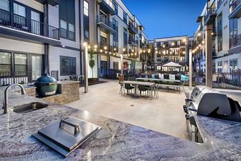 Convenient pool-side grilling stations with big green egg smoker